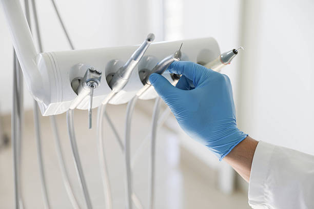 Professional Tooth Extraction technician working in DeFuniak Springs, FL